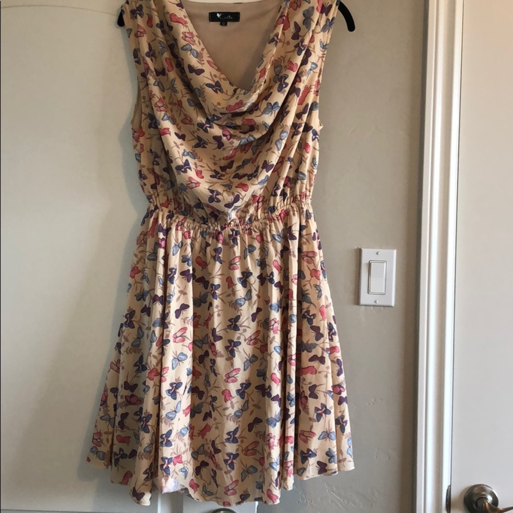 Cream dress with butterflies